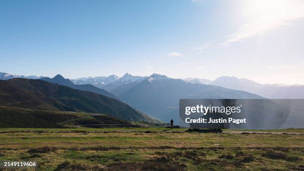 drone view of an unrecognisable person and their campervan wild camping high in the french pyrenees mountains - camionnette photos et images de collection
