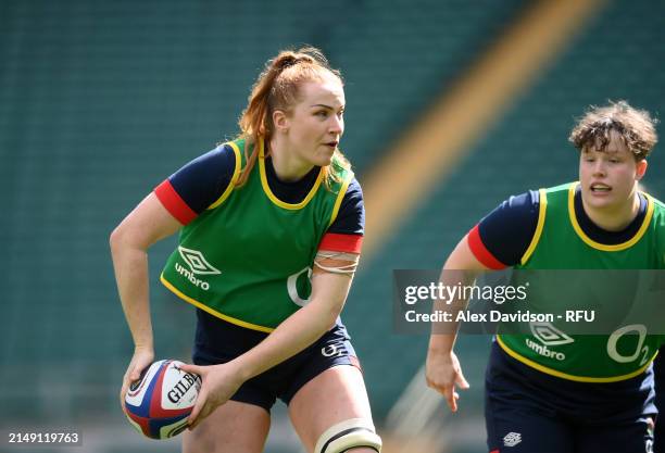 Cath O'Donnell passes during a England Red Roses Training Session at Twickenham Stadium on April 18, 2024 in London, England.