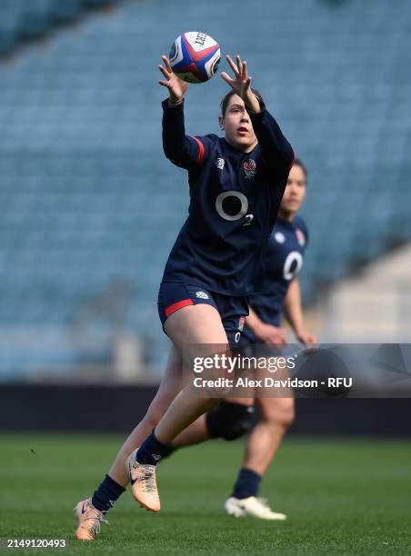 Holly Aitchison runs with the ball during a England Red Roses Training Session at Twickenham Stadium on April 18, 2024 in London, England.