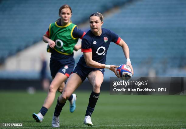 Ellie Kildunne of England passes passes during a England Red Roses Training Session at Twickenham Stadium on April 18, 2024 in London, England.