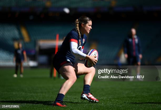 Jess Breach runs with the ball during a England Red Roses Training Session at Twickenham Stadium on April 18, 2024 in London, England.