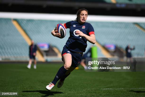 Abby Dow runs during a England Red Roses Training Session at Twickenham Stadium on April 18, 2024 in London, England.