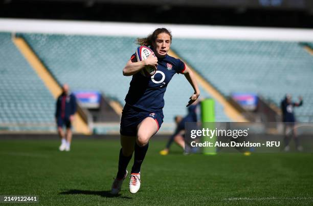 Abby Dow runs during a England Red Roses Training Session at Twickenham Stadium on April 18, 2024 in London, England.