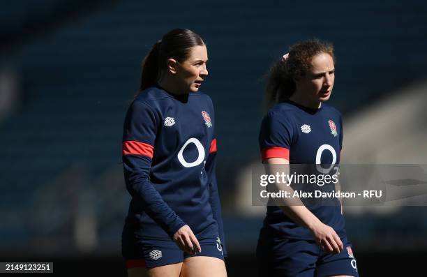 Holly Aitchison and Abby Dow look on during a England Red Roses Training Session at Twickenham Stadium on April 18, 2024 in London, England.