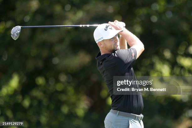 Alex Noren of Sweden plays his shot from the 13th tee Aduring the first round of the Corales Puntacana Championship at Puntacana Resort & Club,...