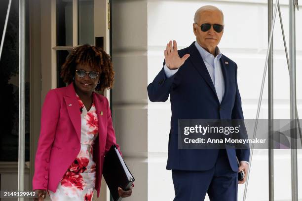 President Joe Biden walks to board Marine One with White House Press Secretary Karine Jean-Pierre on the South Lawn of the White House on April 18,...