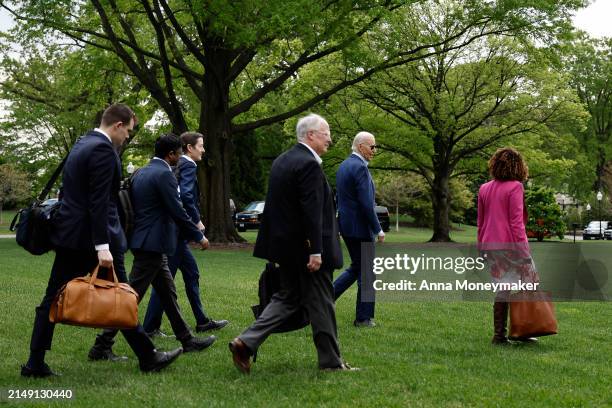 President Joe Biden walks to board Marine One with senior members of his staff on the South Lawn of the White House on April 18, 2024 in Washington,...