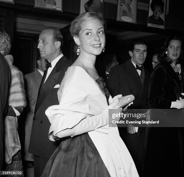 Actress Genevieve Page at a film premiere, London, April 8th 1957.