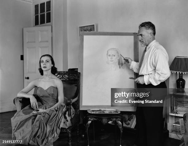 Ballerina Svetlana Berlosova has her portrait drawn by artist Eugene Kassissinoff, August 30th 1955.