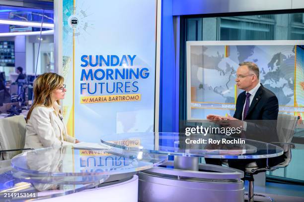 Host Maria Bartiromo with President of Poland Andrezej Duda as he visits "Sunday Morning Futures" at Fox News Channel Studios on April 18, 2024 in...