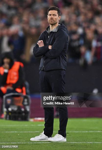 Xabi Alonso, Head Coach of Bayer Leverkusen, looks on during the UEFA Europa League 2023/24 Quarter-Final second leg match between West Ham United FC...