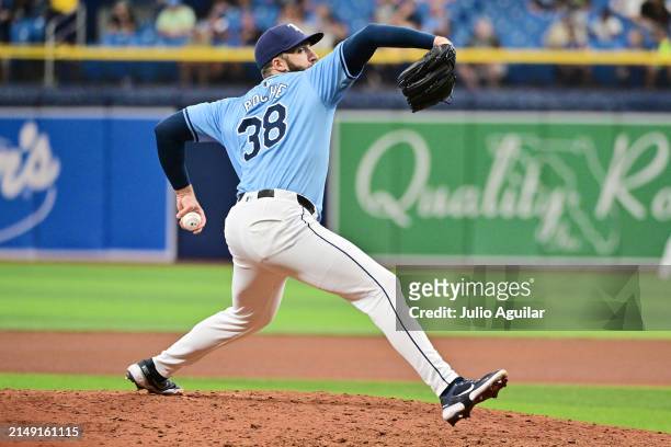 Colin Poche of the Tampa Bay Rays delivers a pitch to the Los Angeles Angels in the ninth inning at Tropicana Field on April 18, 2024 in St...