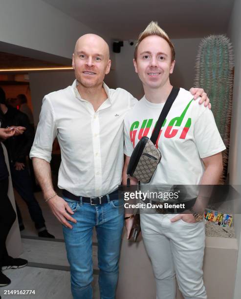 Philip Baldwin and John Galea attend Trejo's Tacos VIP launch on April 18, 2024 in London, England.