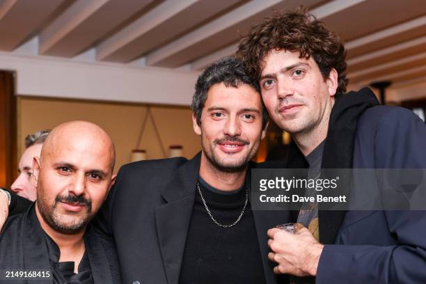 Guest, Milo Astaire and Preston Thompson attend the Burberry party at Harry’s Bar during the opening week of the 60th International Art Exhibition,...