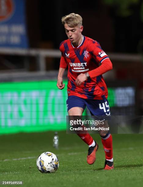 Ross McCausland of Rangers controls the ball during the Cinch Scottish Premiership match between Dundee FC and Rangers FC at Dens Park Stadium on...