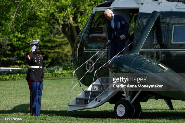 President Joe Biden walks off Marine One on the South Lawn of the White House on April 18, 2024 in Washington, DC. Biden traveled to Philadelphia,...