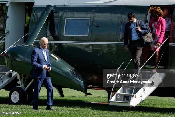 President Joe Biden walks on the South Lawn after landing on Marine One with senior members of his staff at the White House on April 18, 2024 in...