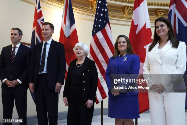 Secretary of the Treasury Janet Yellen poses for photos with Treasurer Jim Chalmers of Australia, Chancellor of the Exchequer Jeremy Hunt of the...