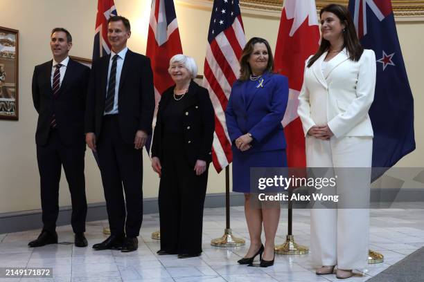 Secretary of the Treasury Janet Yellen poses for photos with Treasurer Jim Chalmers of Australia, Chancellor of the Exchequer Jeremy Hunt of the...