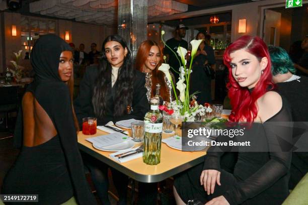 Leomie Anderson, Neelam Gill, Munroe Bergdorf and Abby Roberts attend the launch of BISTROTHEQUE 20: The Season, in partnership with Tanqueray No....