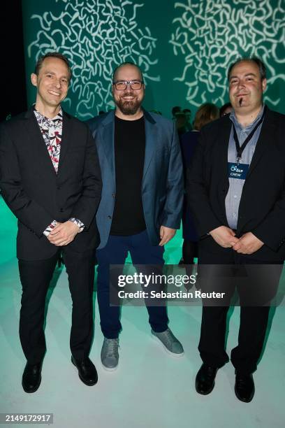 Guest, Lars Janssen and Dieter Marchsreiter attend the annual German Computer Game Award at Eisbach Studios on April 18, 2024 in Munich, Germany.