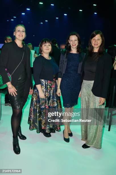 Simone Watzinger, Victoria Chmiell, guest and Natascha Grünpeter attend the annual German Computer Game Award at Eisbach Studios on April 18, 2024 in...
