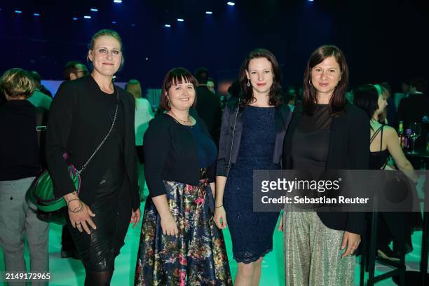 Simone Watzinger, Victoria Chmiell, guest and Natascha Grünpeter attend the annual German Computer Game Award at Eisbach Studios on April 18, 2024 in...