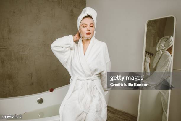 young happy woman enjoying her spa day - slow living stock pictures, royalty-free photos & images