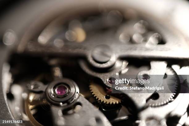 mechanical clock gears - clock repair stock pictures, royalty-free photos & images