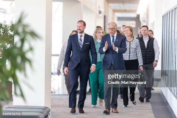 Crown Prince Haakon of Norway and Washington Governor Jay Inslee walk and talk at the Museum of Flight on April 18, 2024 in Tukwila, Washington,...