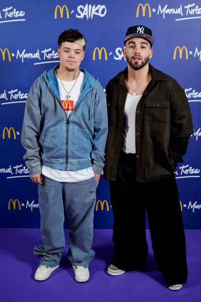 ESP: Saiko And Manuel Turizo Attend McDonald's Photocall In Madrid