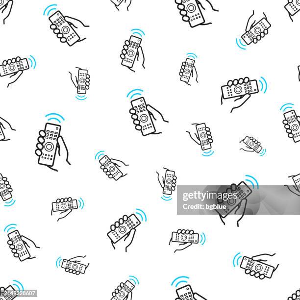 hand with remote control. seamless pattern. line icons on white background - holding remote control stock illustrations