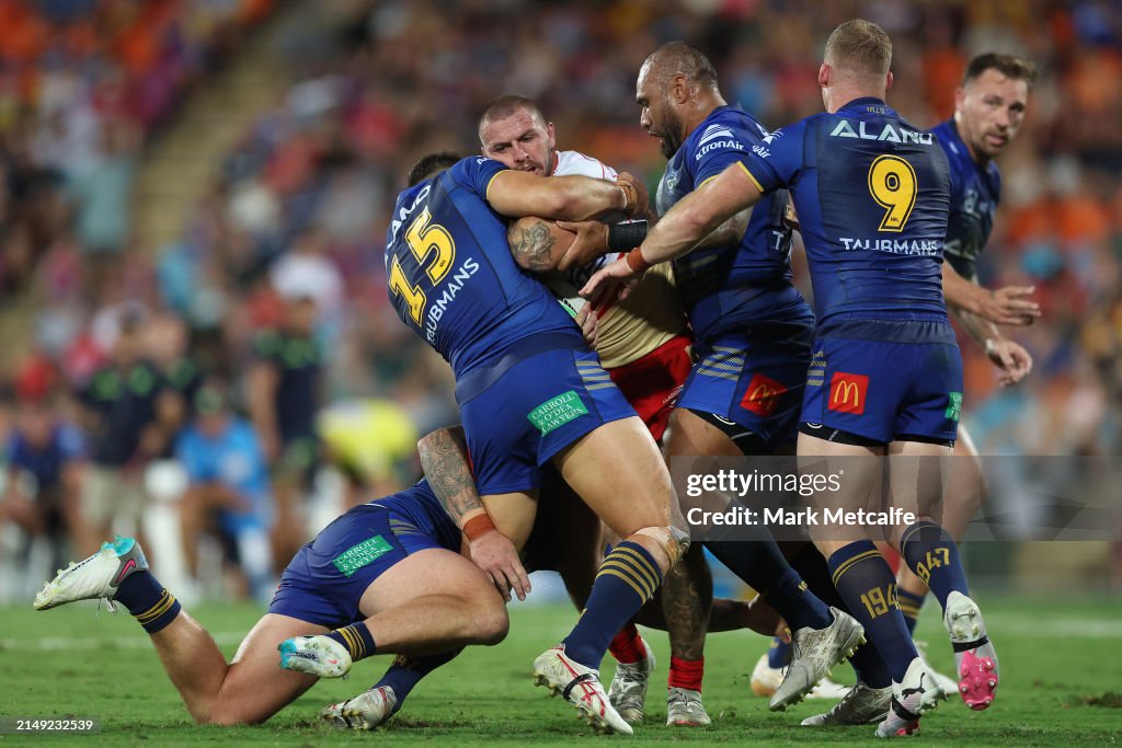 Ray Stone Ray Stone of the Dolphinsis tackled during the round seven NRL match ...