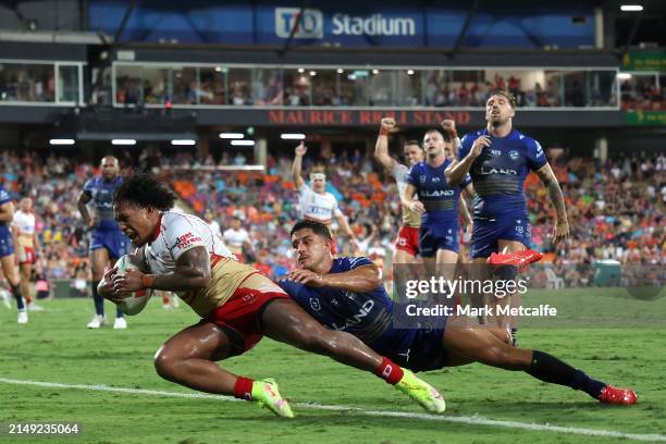 Tesi Niu of the Dolphins scores a try during the round seven NRL match between Parramatta Eels and Dolphins at TIO Stadium on April 19 in Darwin,...