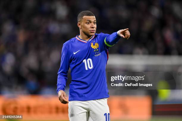 Kylian Mbappe of France gestures during the international friendly match between France and Germany at Groupama Stadium on March 23, 2024 in Lyon,...