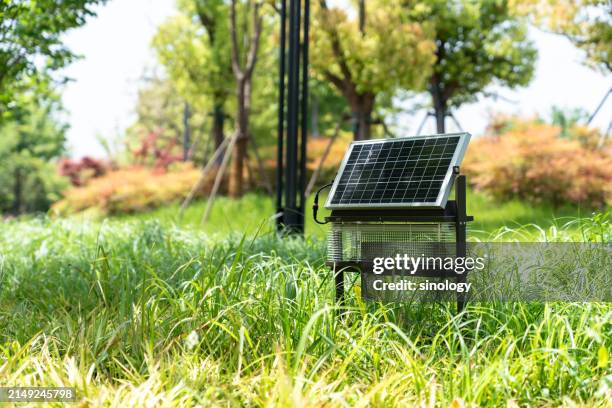 solar panel with mosquito killer lamp - insect light trap stock pictures, royalty-free photos & images