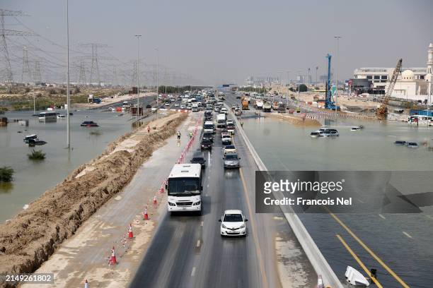 General view of traffic on a highway after flooding on April 19, 2024 in Dubai, United Arab Emirates. Atypically heavy rains in the UAE on Monday and...