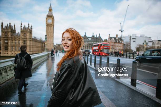 woman having fun on westminster bridge - tourist stock pictures, royalty-free photos & images