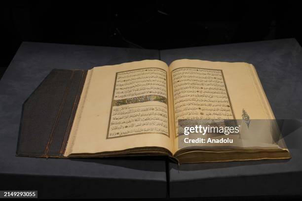 View of the handwritten Holy Quran mushaf commissioned by Munire Sultan, the daughter of Ottoman Sultan Abdulmejid I, on display at the Sotheby's...
