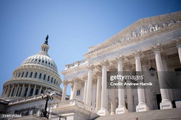 The Dome of the U.S. Capitol Building is visible behind the East Front entrance to the Senate Chamber on April 23, 2024 in Washington, DC. The Senate...