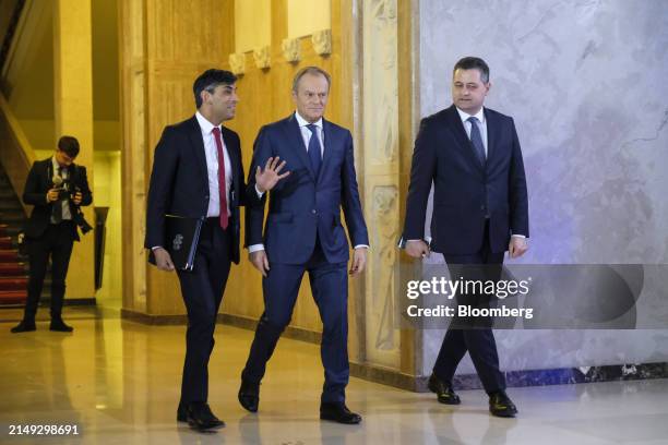 Rishi Sunak, UK prime minister, left, and Donald Tusk, Poland's prime minister, center, in Warsaw, Poland, on Tuesday, April 23, 2024. The UK will...