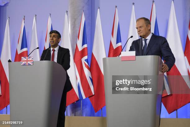 Rishi Sunak, UK prime minister, left, and Donald Tusk, Poland's prime minister, during a news conference in Warsaw, Poland, on Tuesday, April 23,...