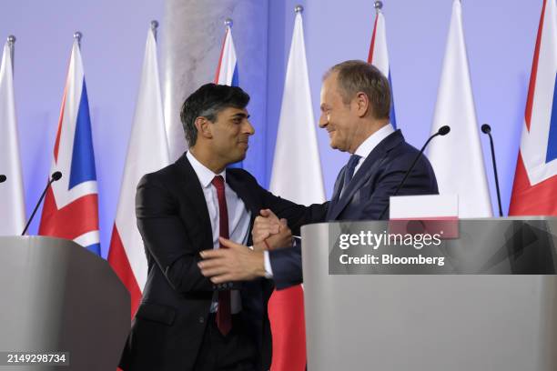 Rishi Sunak, UK prime minister, left, and Donald Tusk, Poland's prime minister, shake hands during a news conference in Warsaw, Poland, on Tuesday,...