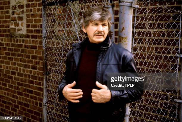 American actor Charles Bronson as the vigilante killer Paul Kersey on the set of the action movie 'Death Wish 3', circa 1985.