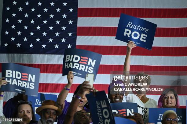 Supporters of US President Joe Biden cheer as they await his speech about reproductive freedom at Hillsborough Community College-Dale Mabry Campus in...