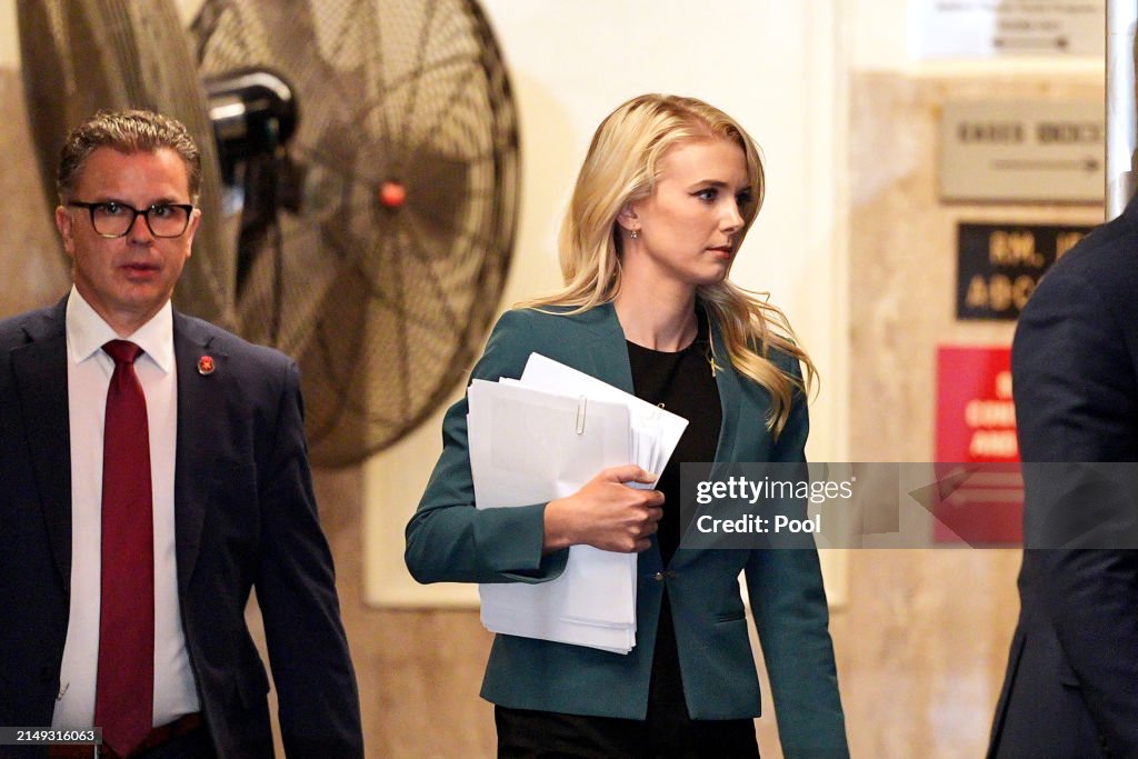 Communications Aide Natalie Harp Appears Outside The Courtroom During communications-aide-natalie-harp-appears-outside-the-courtroom-during