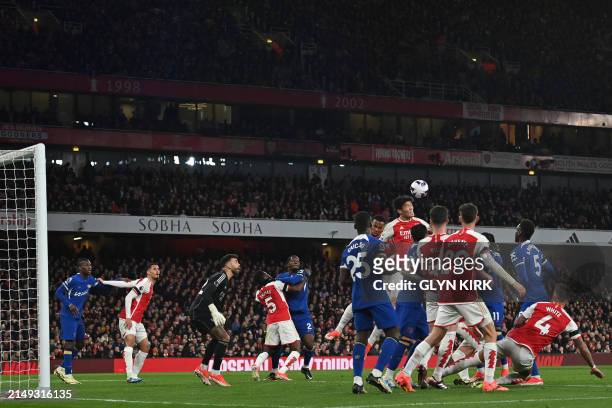 Arsenal's Japanese defender Takehiro Tomiyasu wins a header during the English Premier League football match between Arsenal and Chelsea at the...
