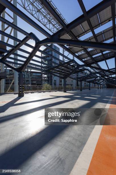 industrial style parking lot, beijing, china - industrial style stock pictures, royalty-free photos & images