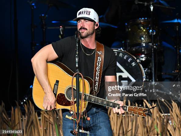 Singer Seth Riley Singer Riley Green performs onstage during his