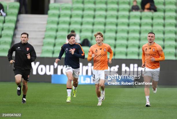 The Brisbane Roar warm up prior to the A-League Men round 25 match between Melbourne Victory and Brisbane Roar at AAMI Park, on April 20 in...